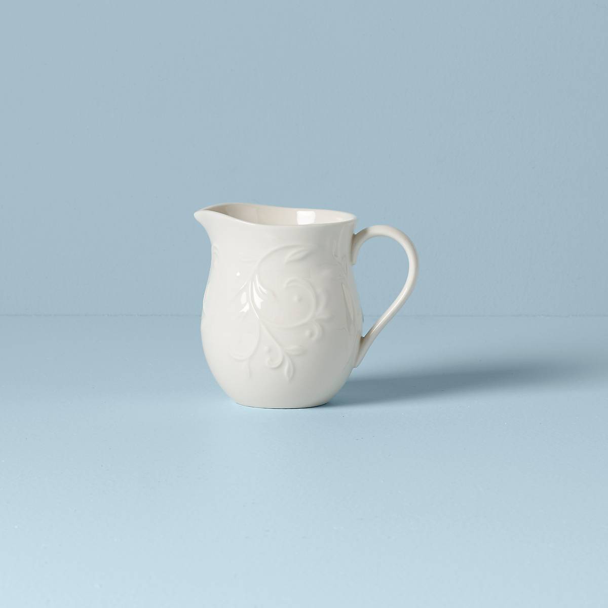 Opal Innocence Carved Creamer